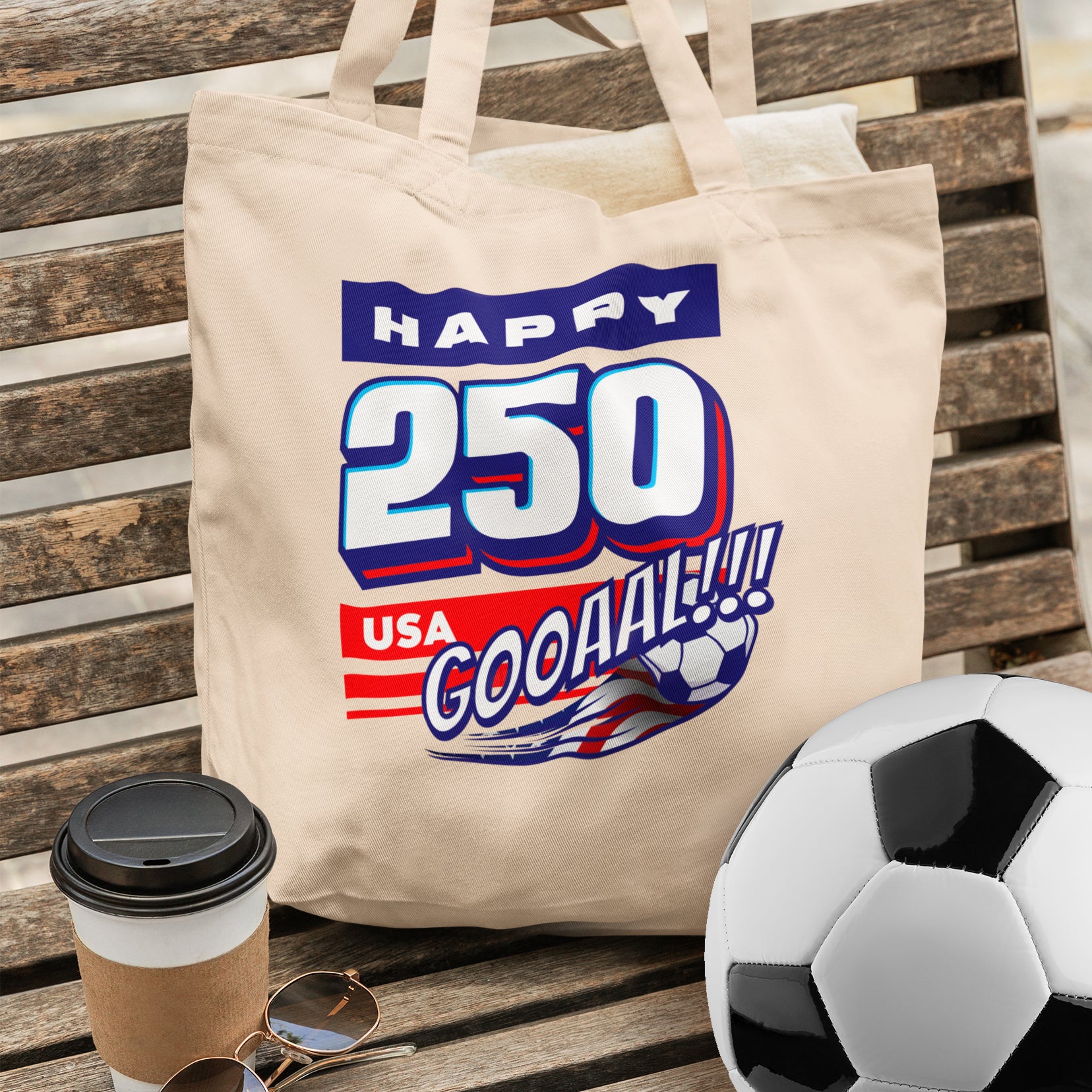 a tote bag sitting on top of a wooden bench next to a soccer ball