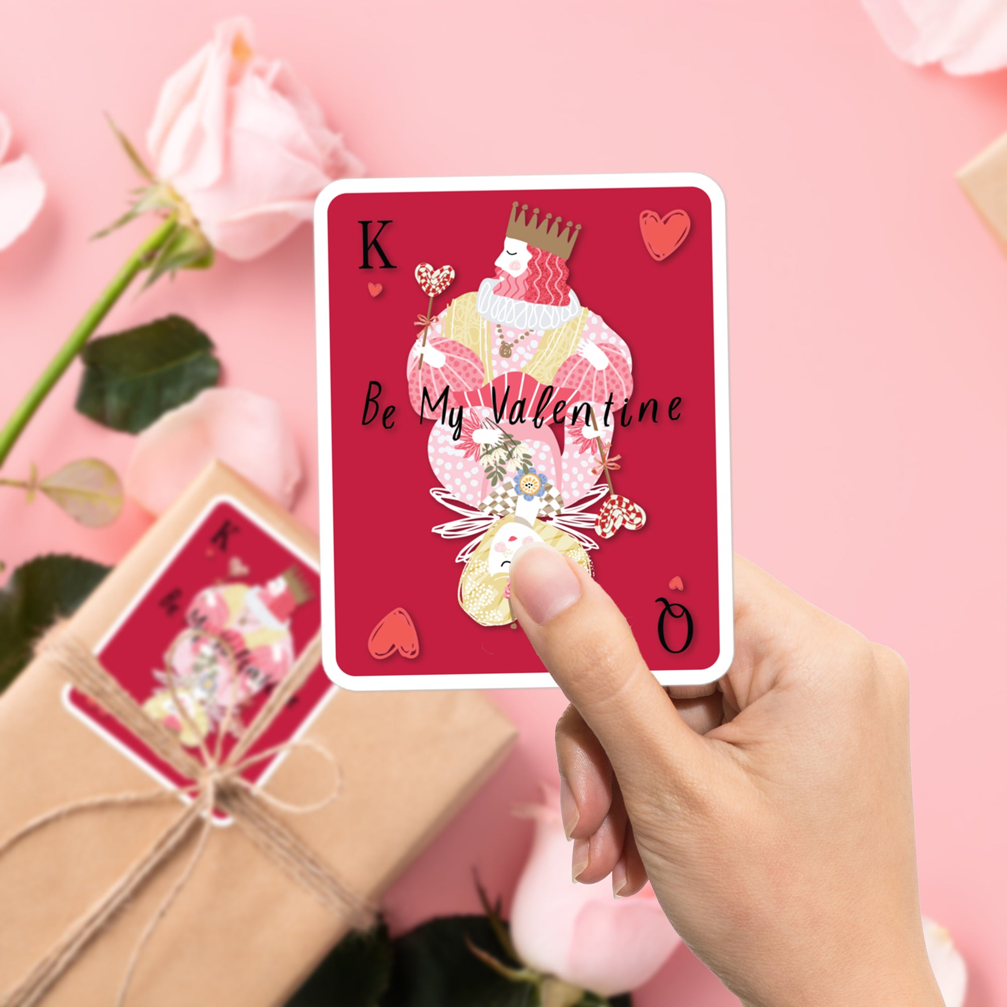 a person holding up a card that says be my valentine