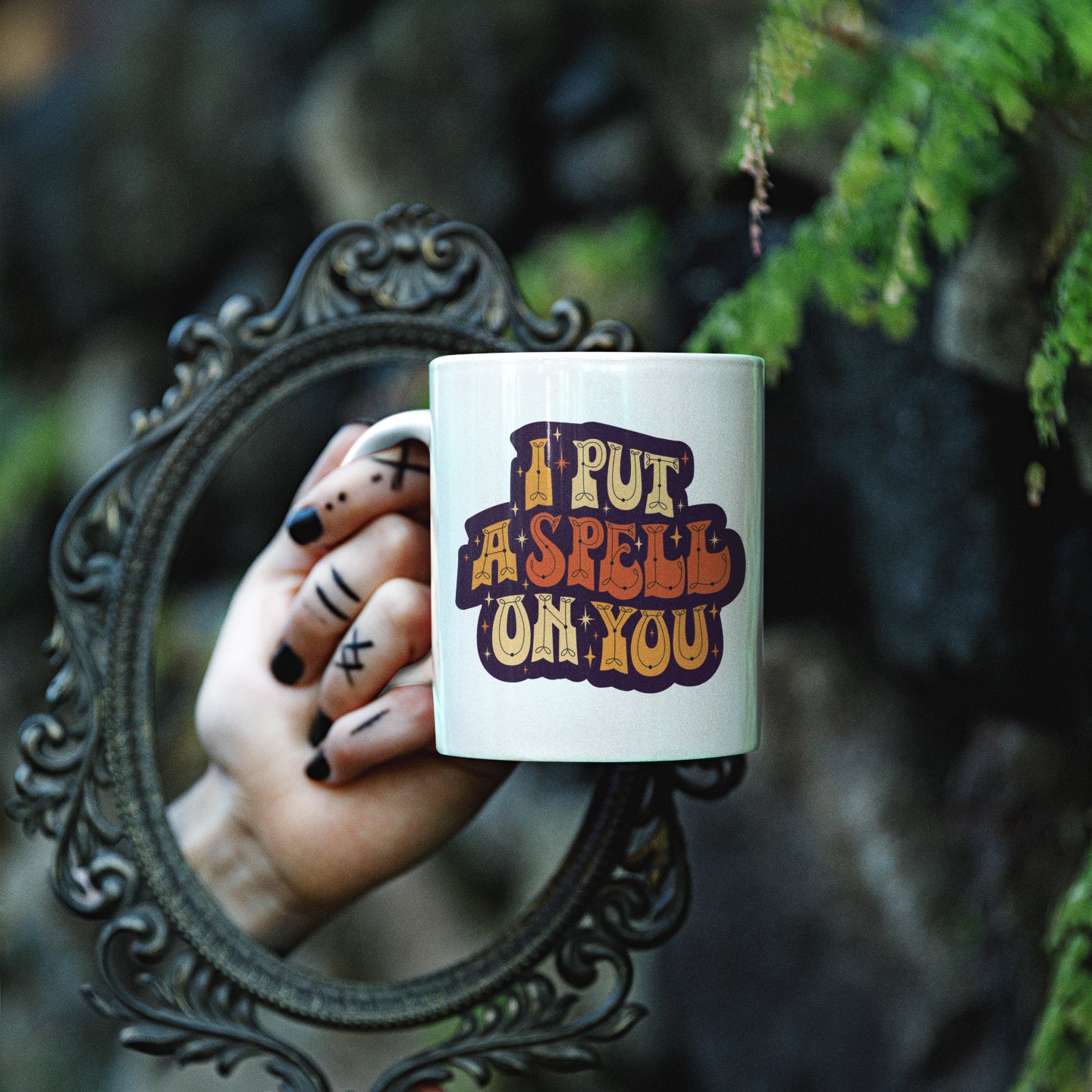 a person holding a coffee mug with a quote on it