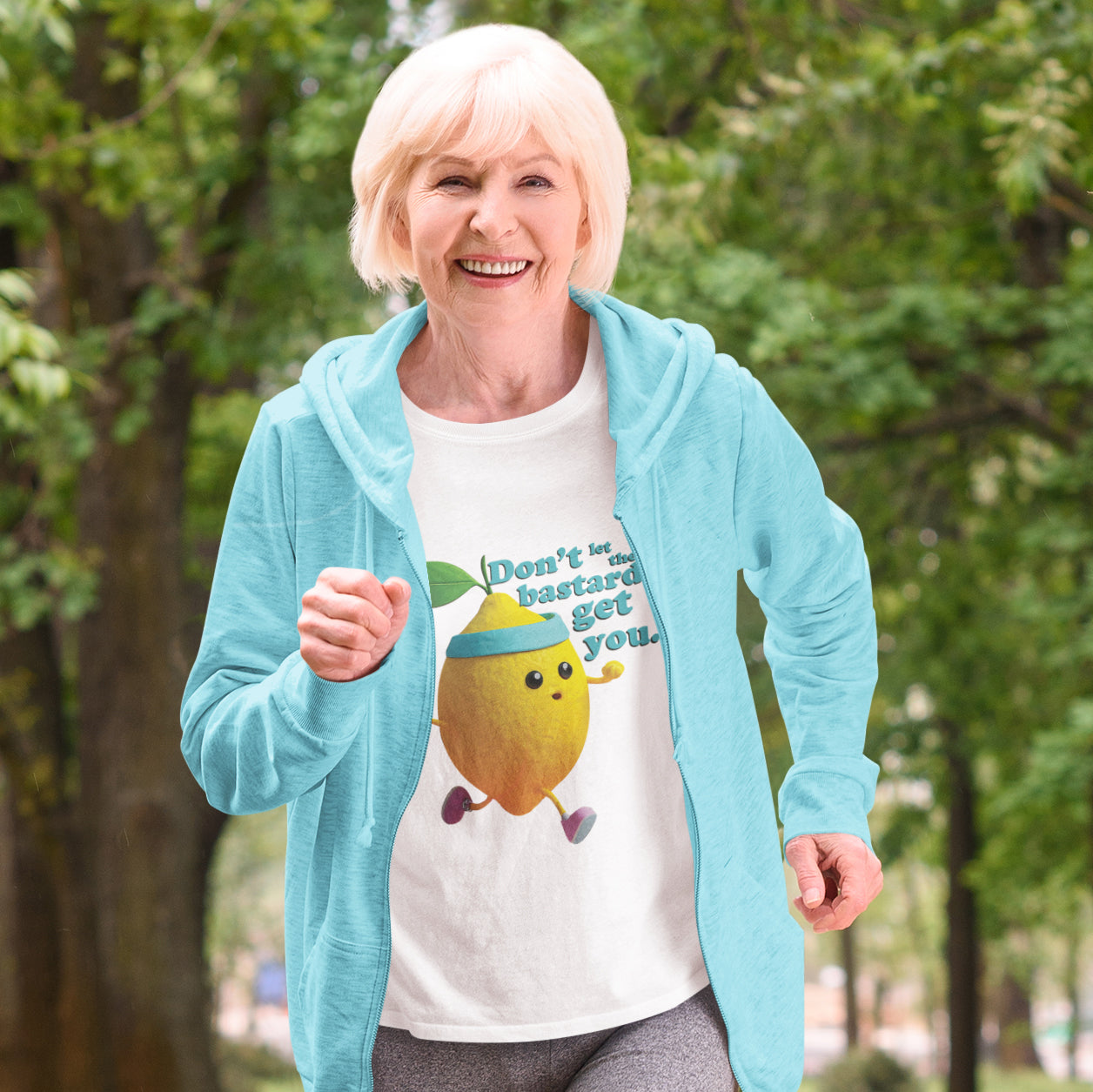 a woman wearing a t - shirt with a lemon on it