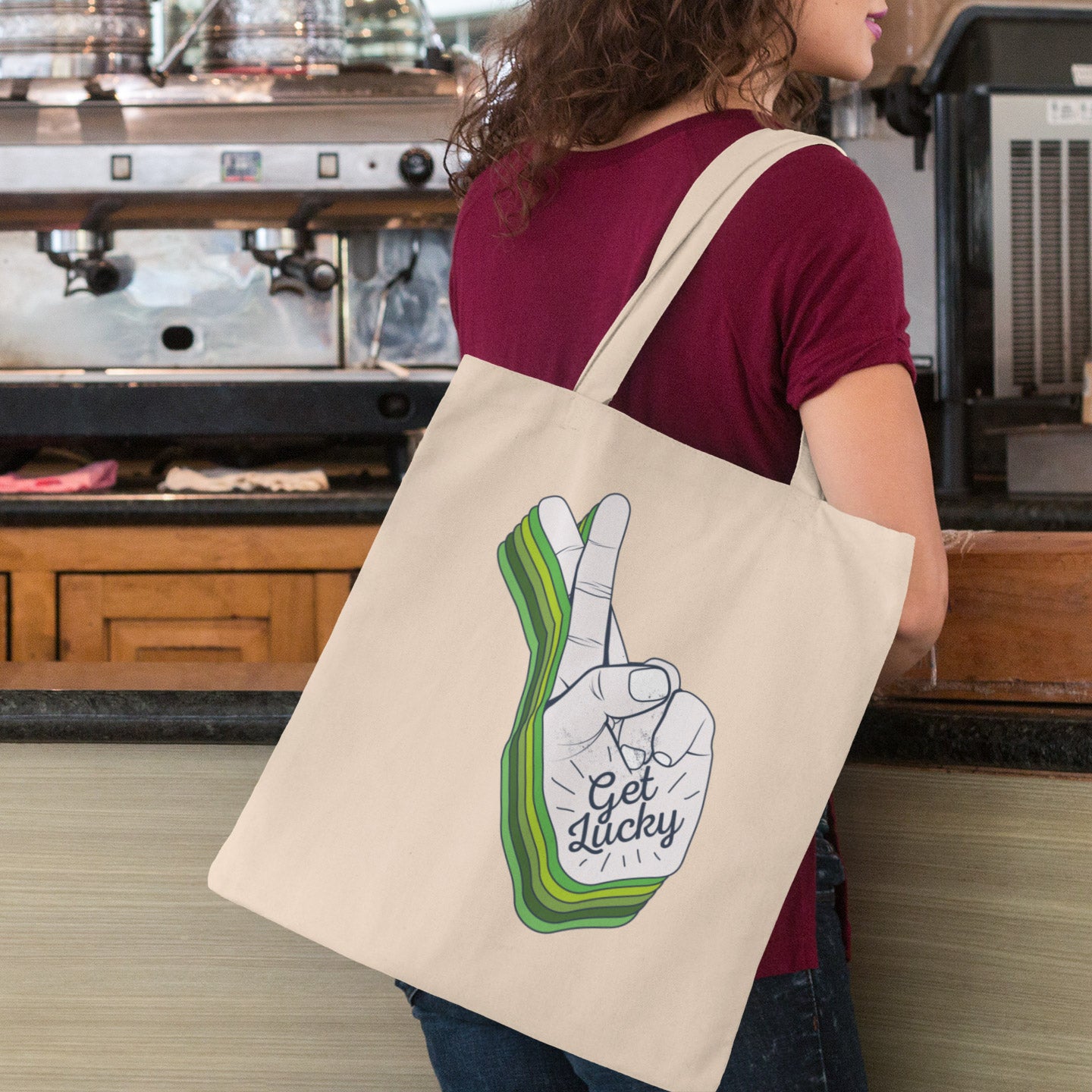 a woman carrying a tote bag with a peace sign on it