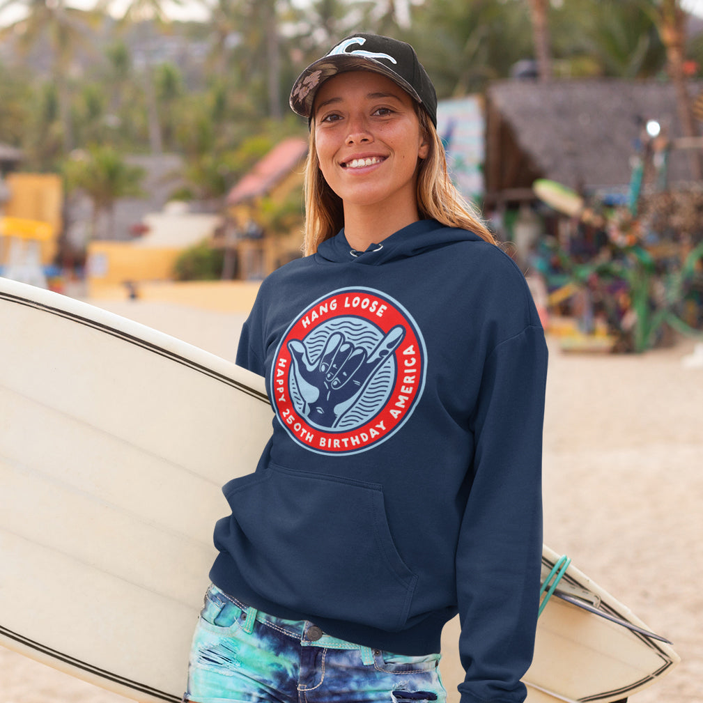 a woman holding a surfboard on a beach