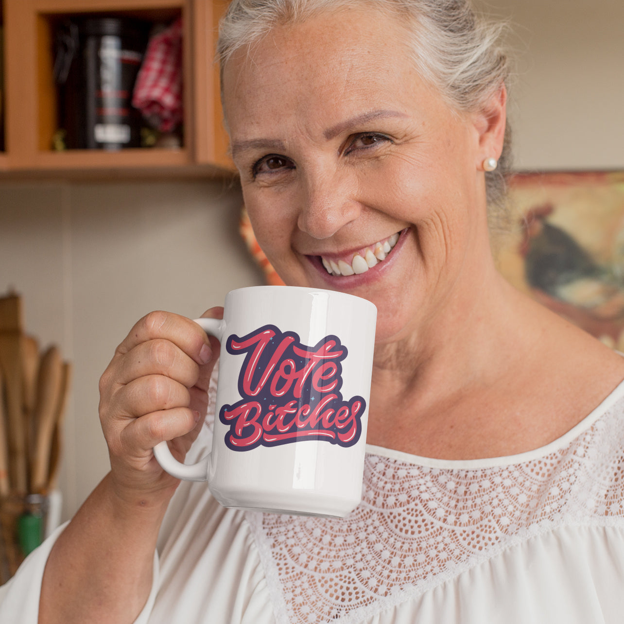 a woman is holding a coffee mug in her hands