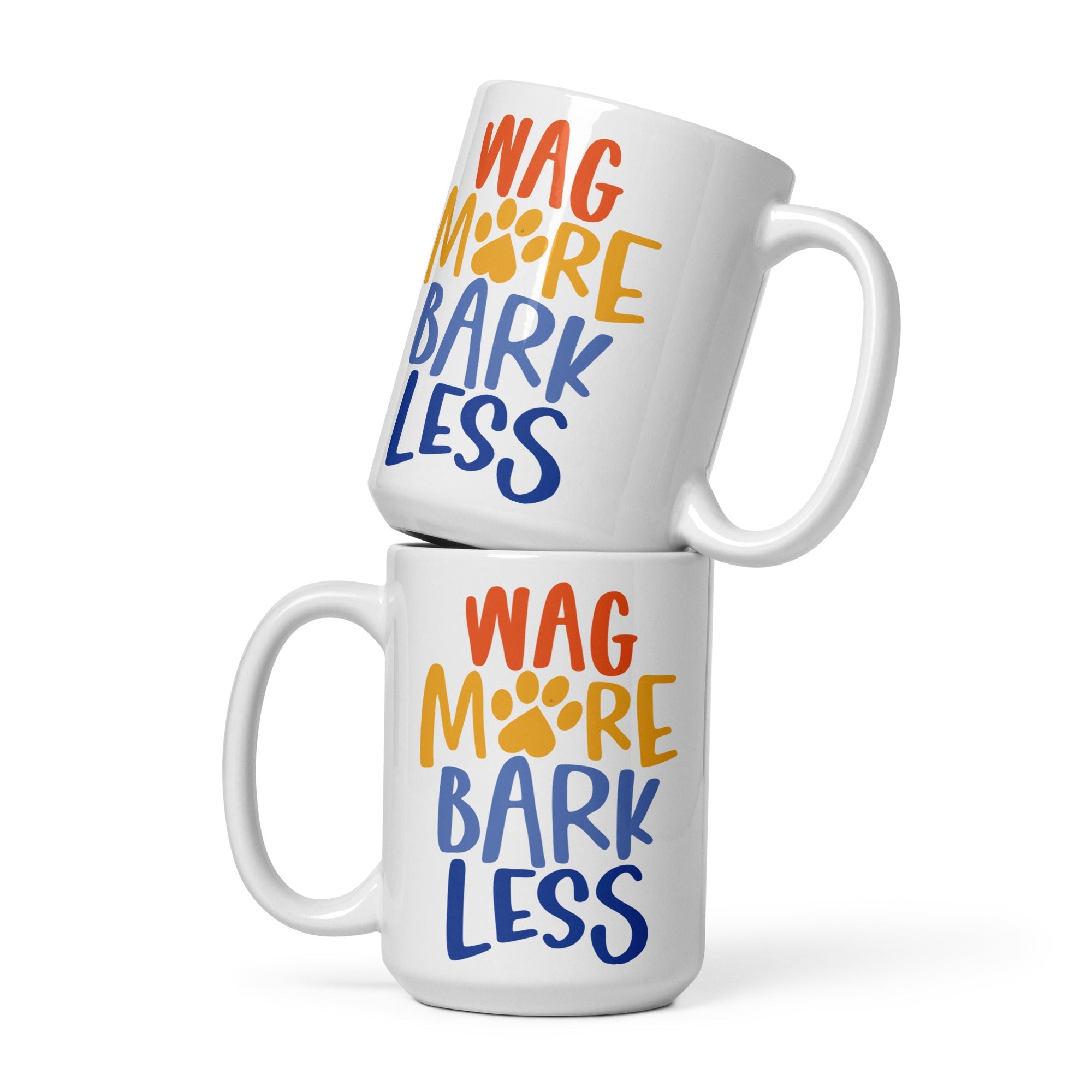 two coffee mugs that say wag more bark less