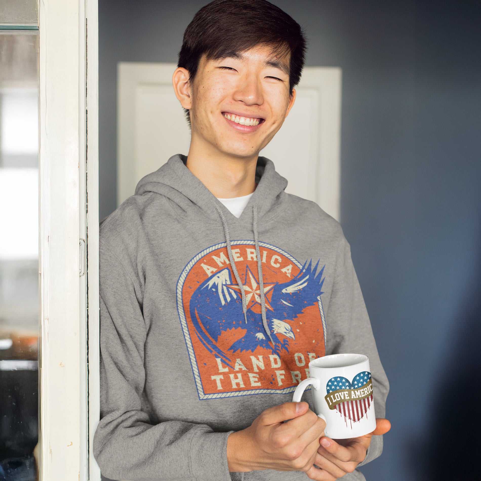 a man holding a coffee mug in his hands