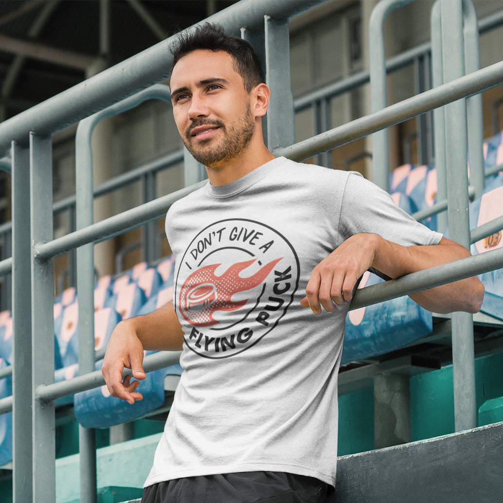 a man standing in front of a bleachers