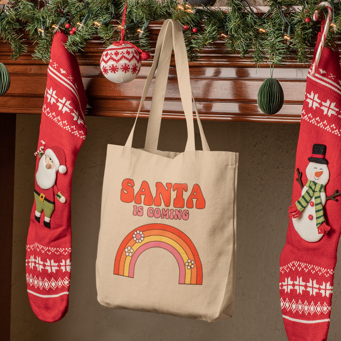 three christmas stockings hanging from a mantel with santa is coming