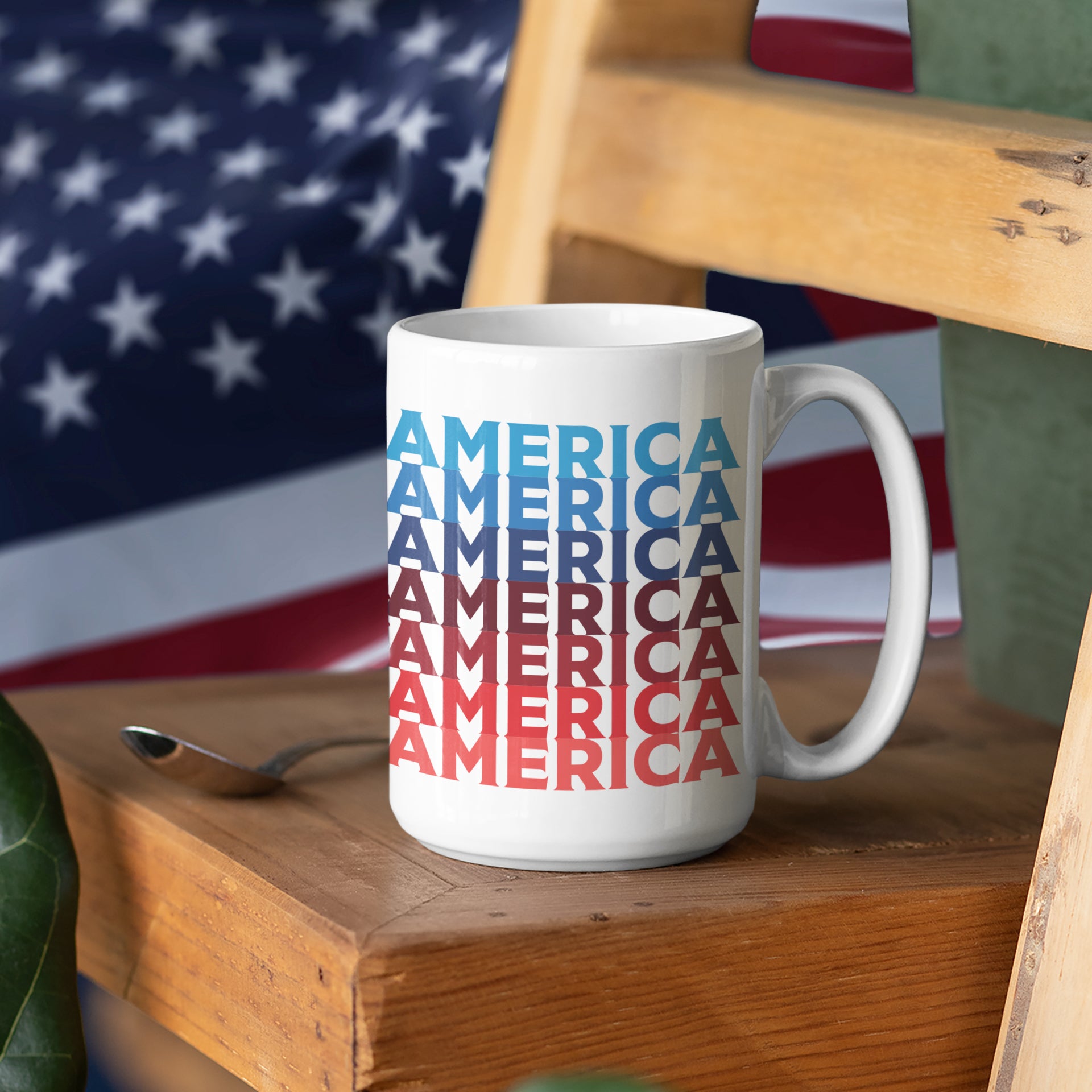 a white coffee mug sitting on top of a wooden table