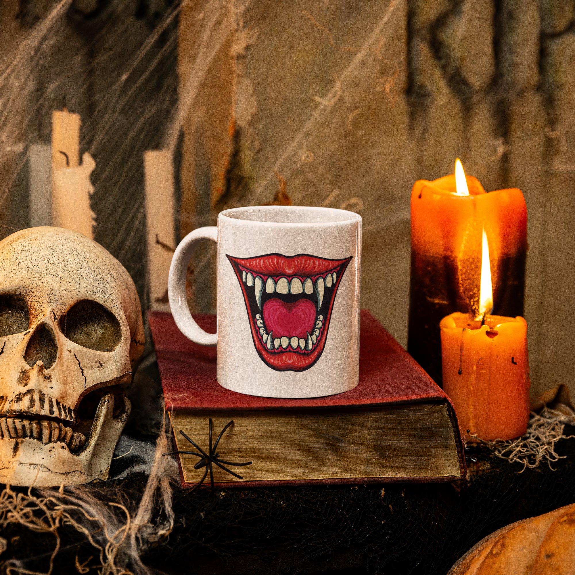 a skull and a cup on a table