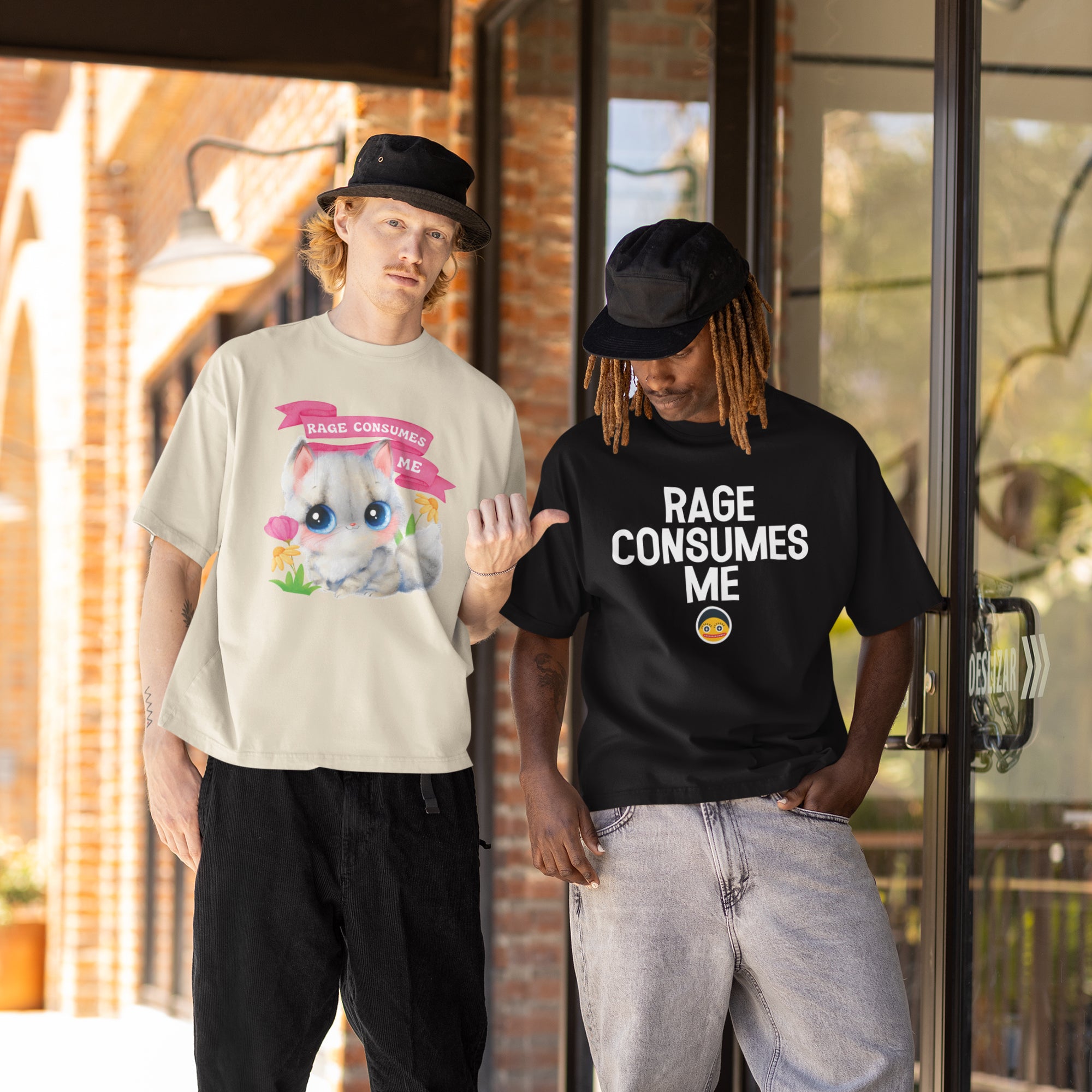 Two men standing outside a building, one wearing a white t-shirt with a cat graphic and the other wearing a black t-shirt with the text "RAGE CONSUMES ME" printed on it.