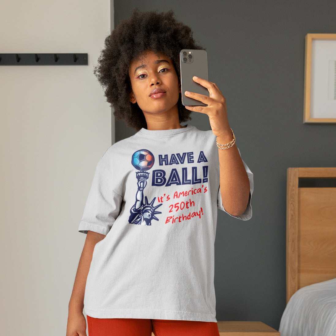 a woman taking a picture of herself with her cell phone