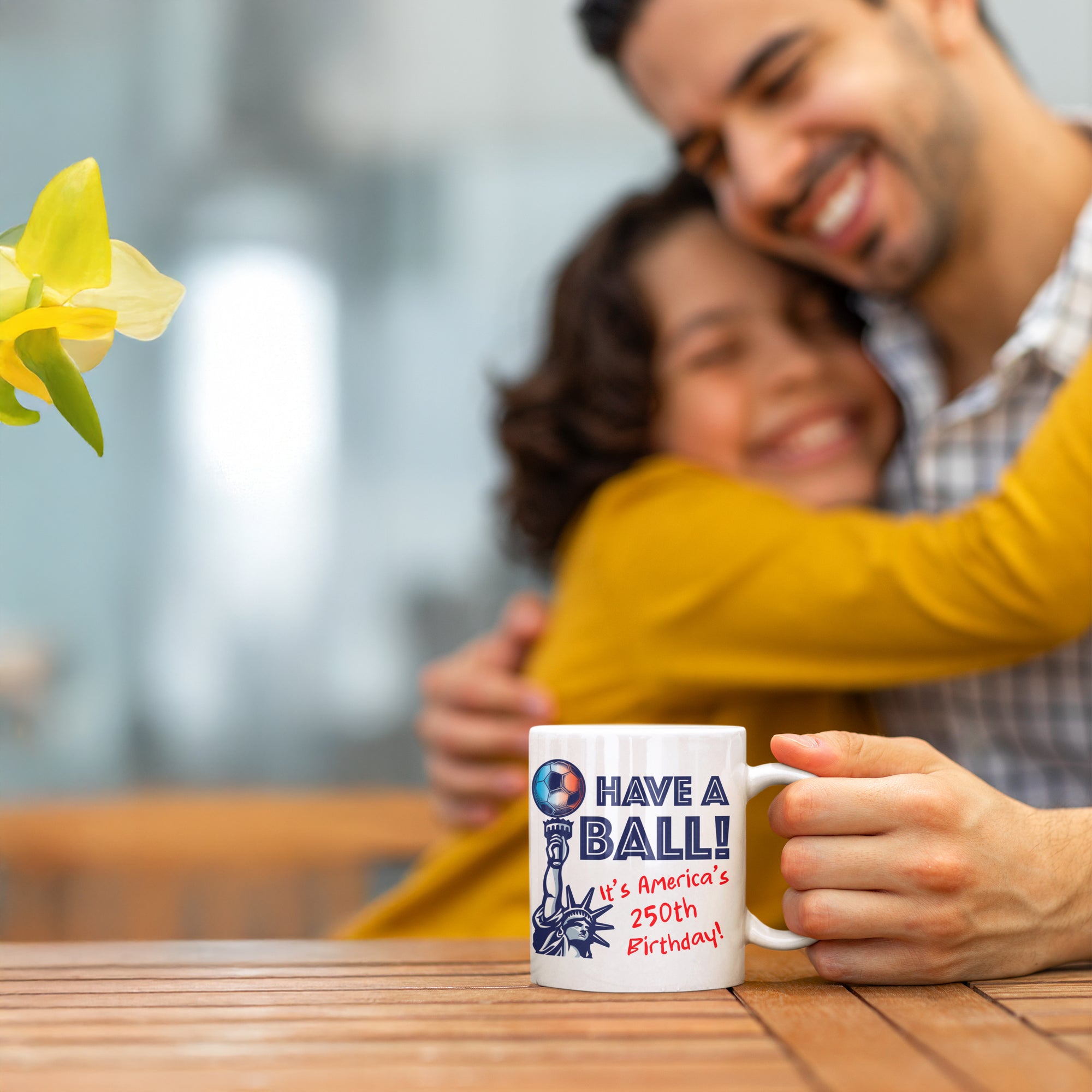 a man hugging a woman while holding a coffee mug