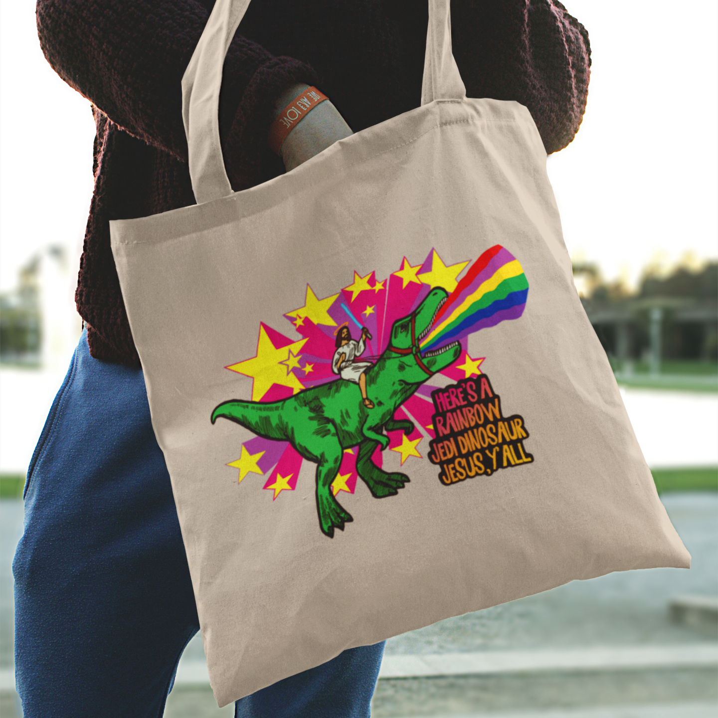 a person carrying a bag with a dinosaur on it