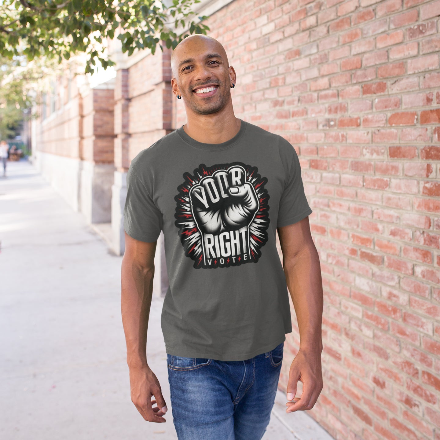 a man standing in front of a brick wall