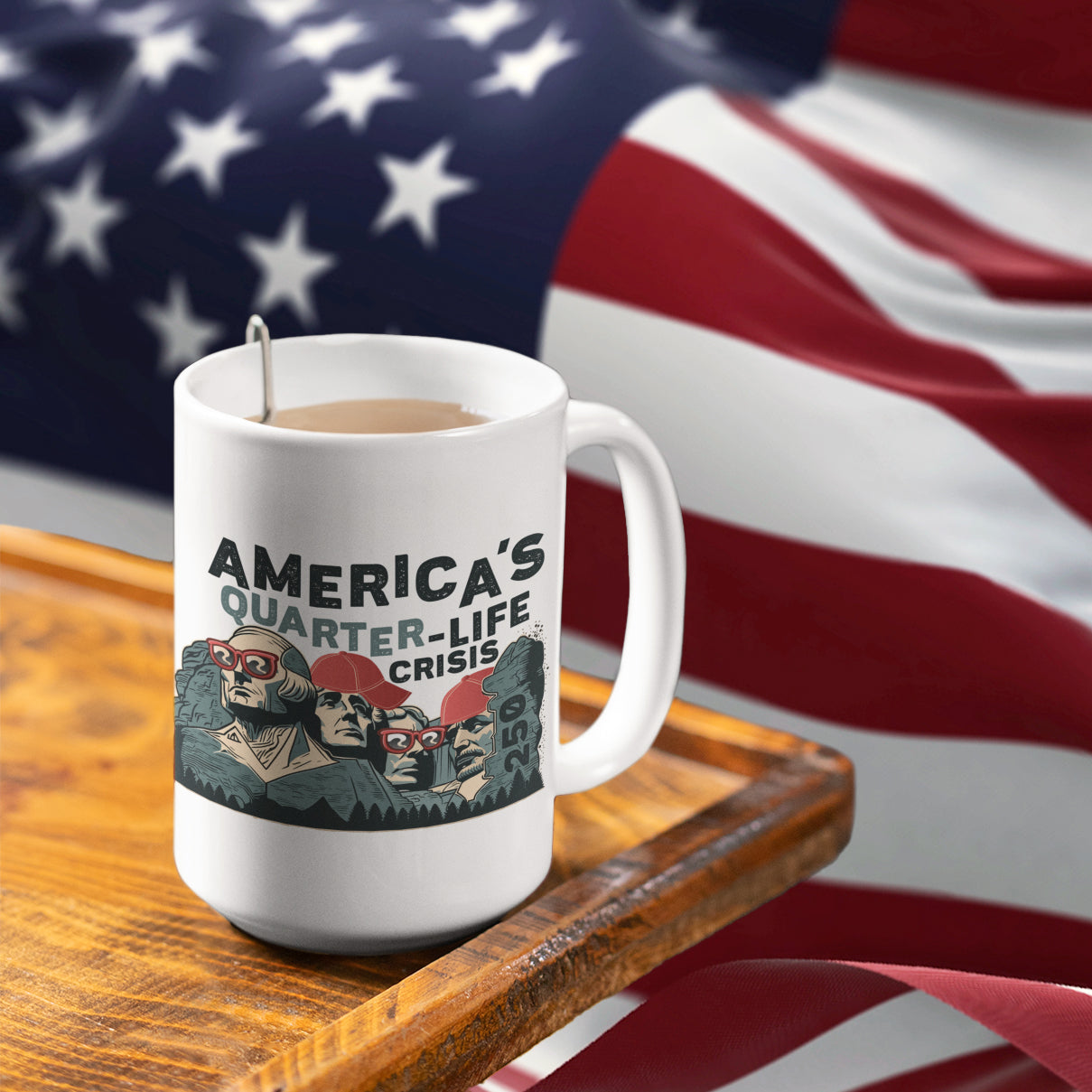 a coffee mug sitting on top of a wooden table