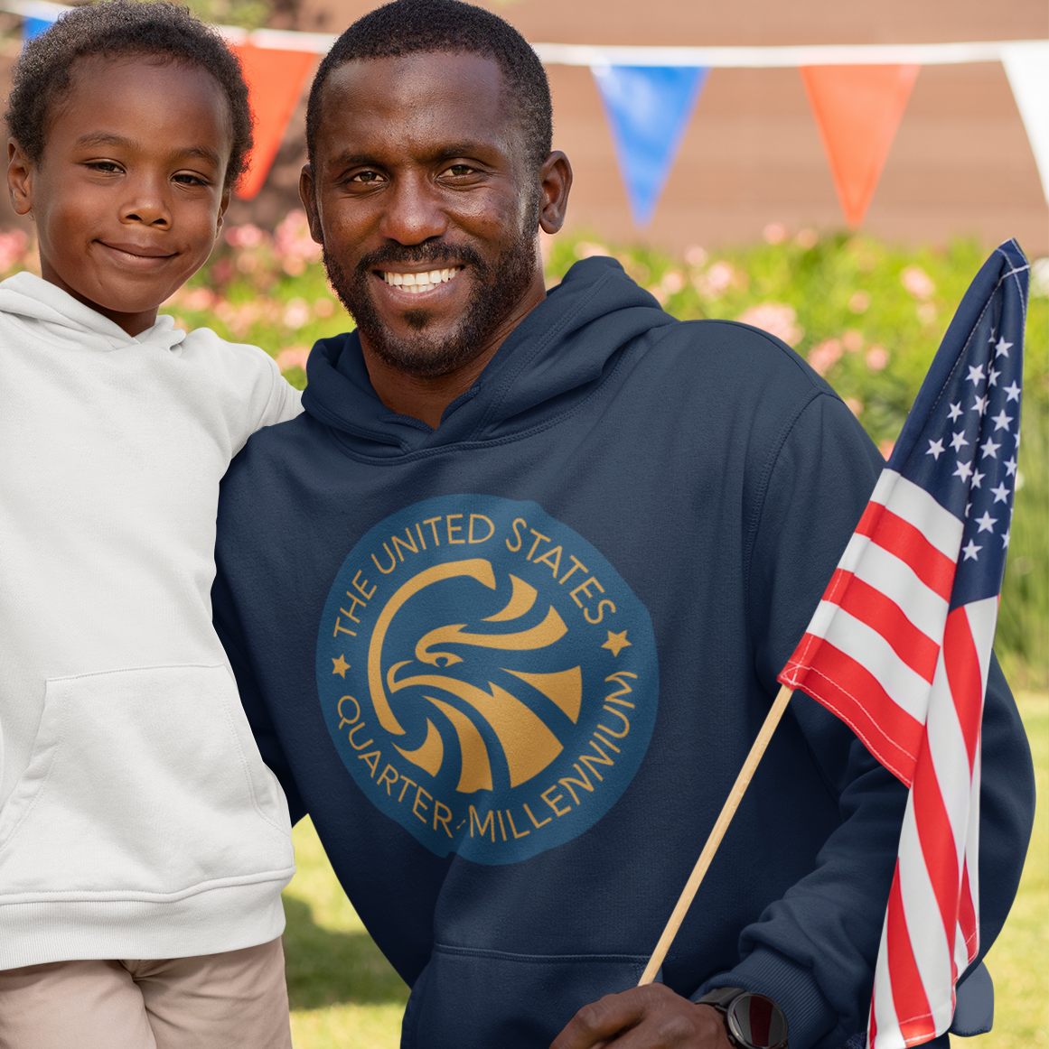 a man and a little girl holding an american flag