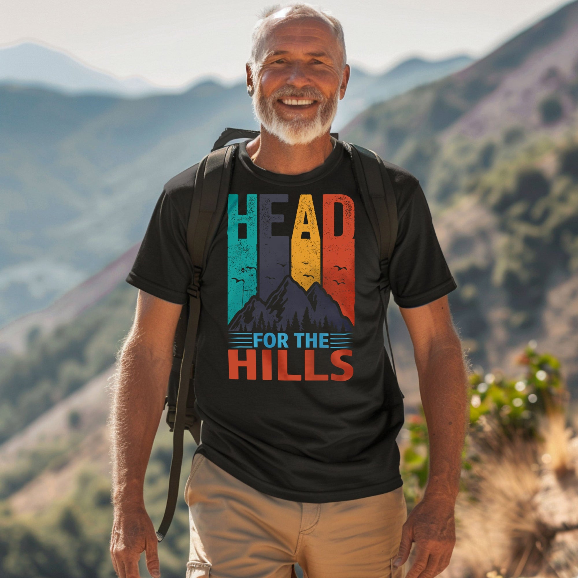 a man with a backpack standing on top of a mountain