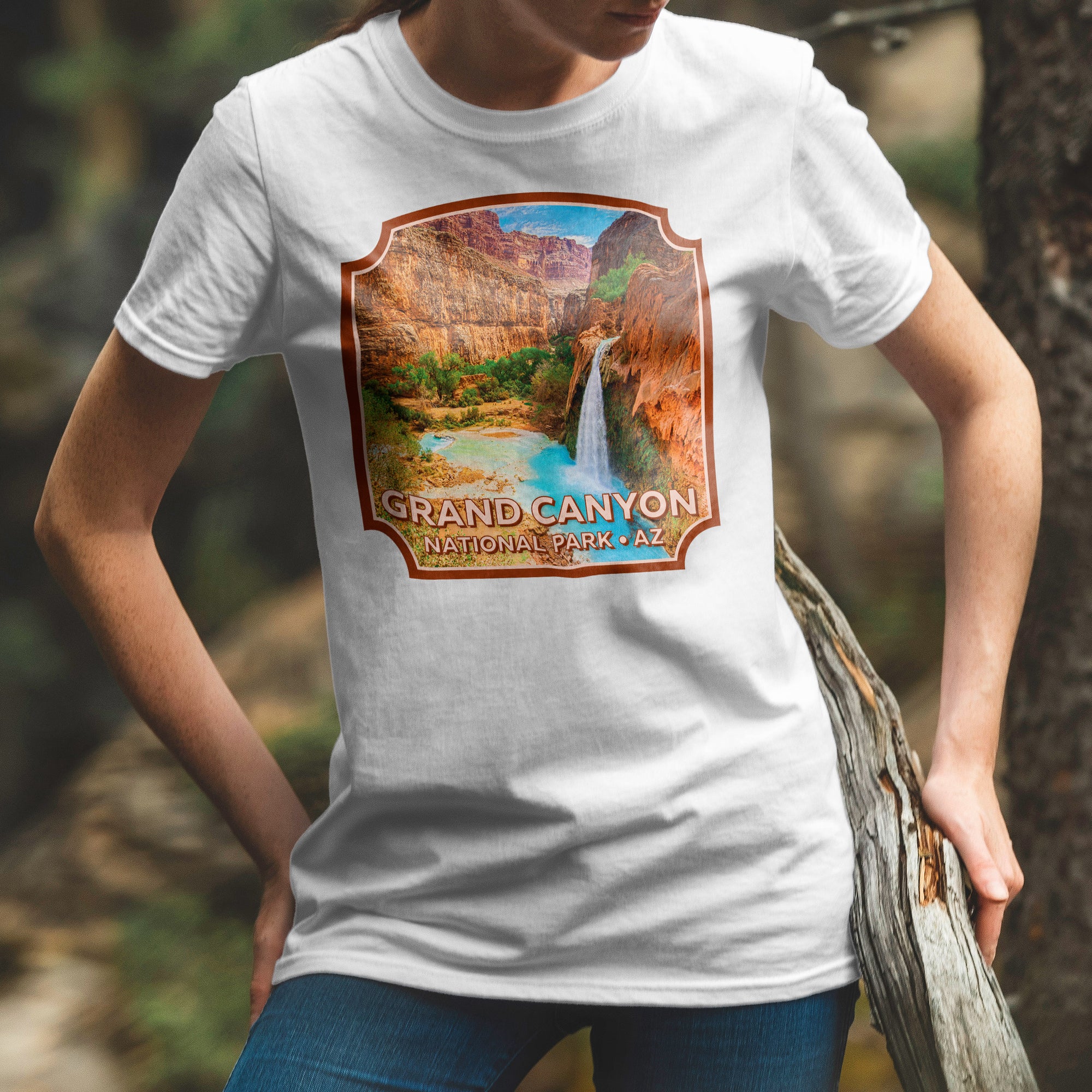 a woman wearing a grand canyon t - shirt