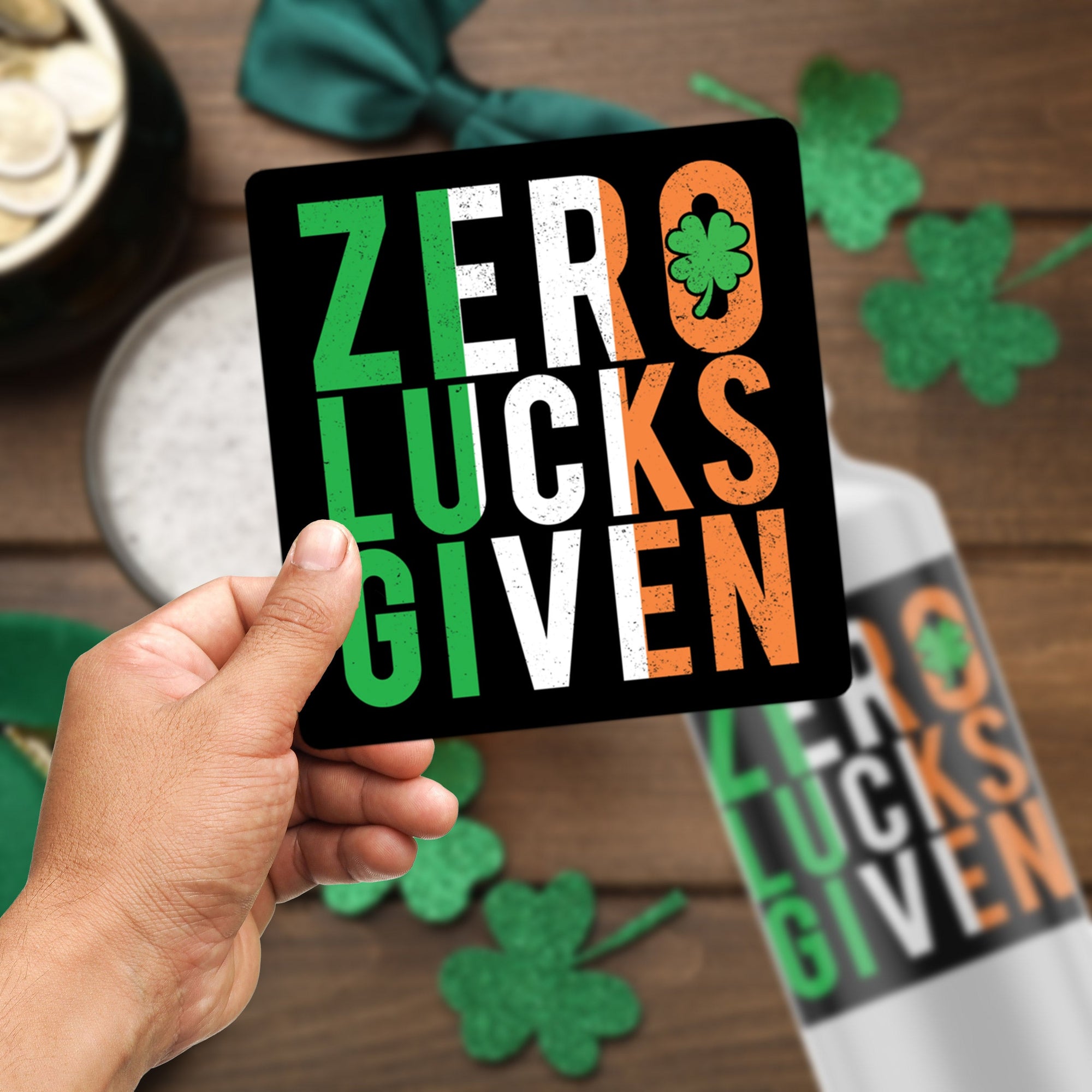 a person holding up a card that says zero luck's given