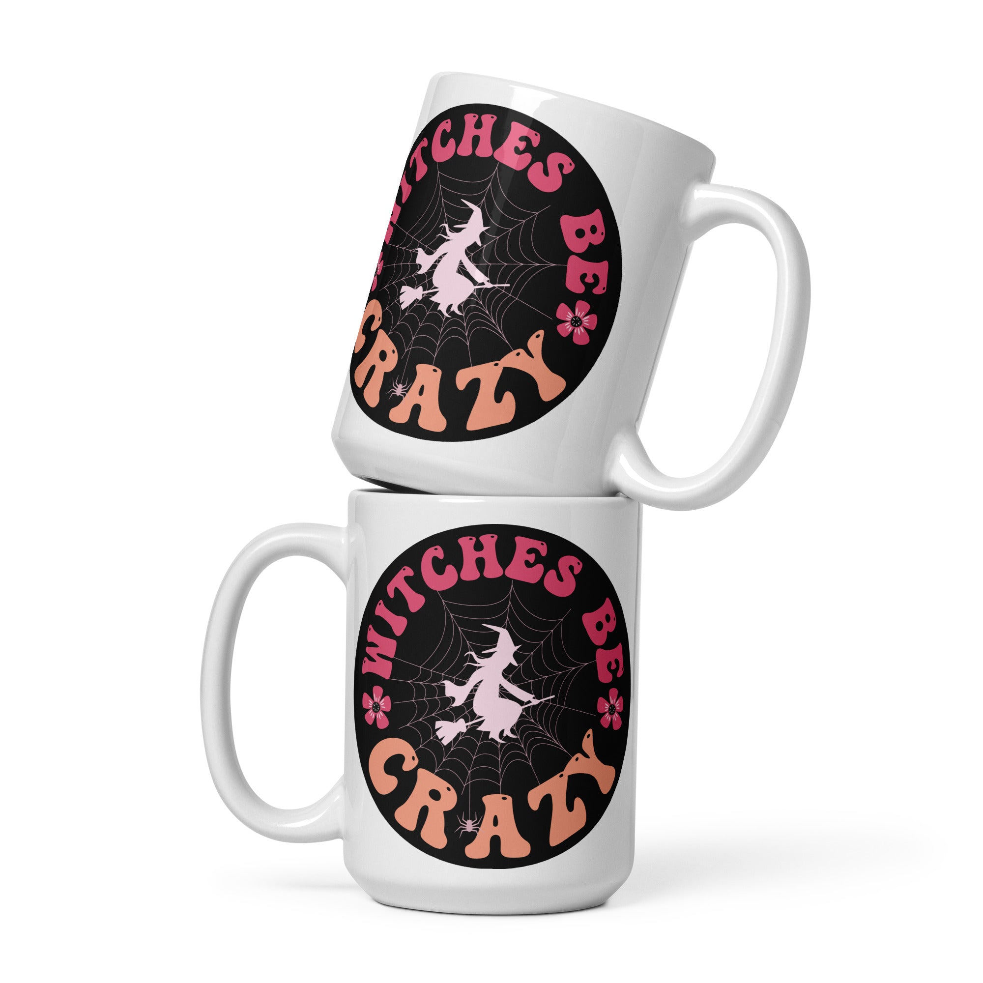 two white coffee mugs with witches be crazy on them