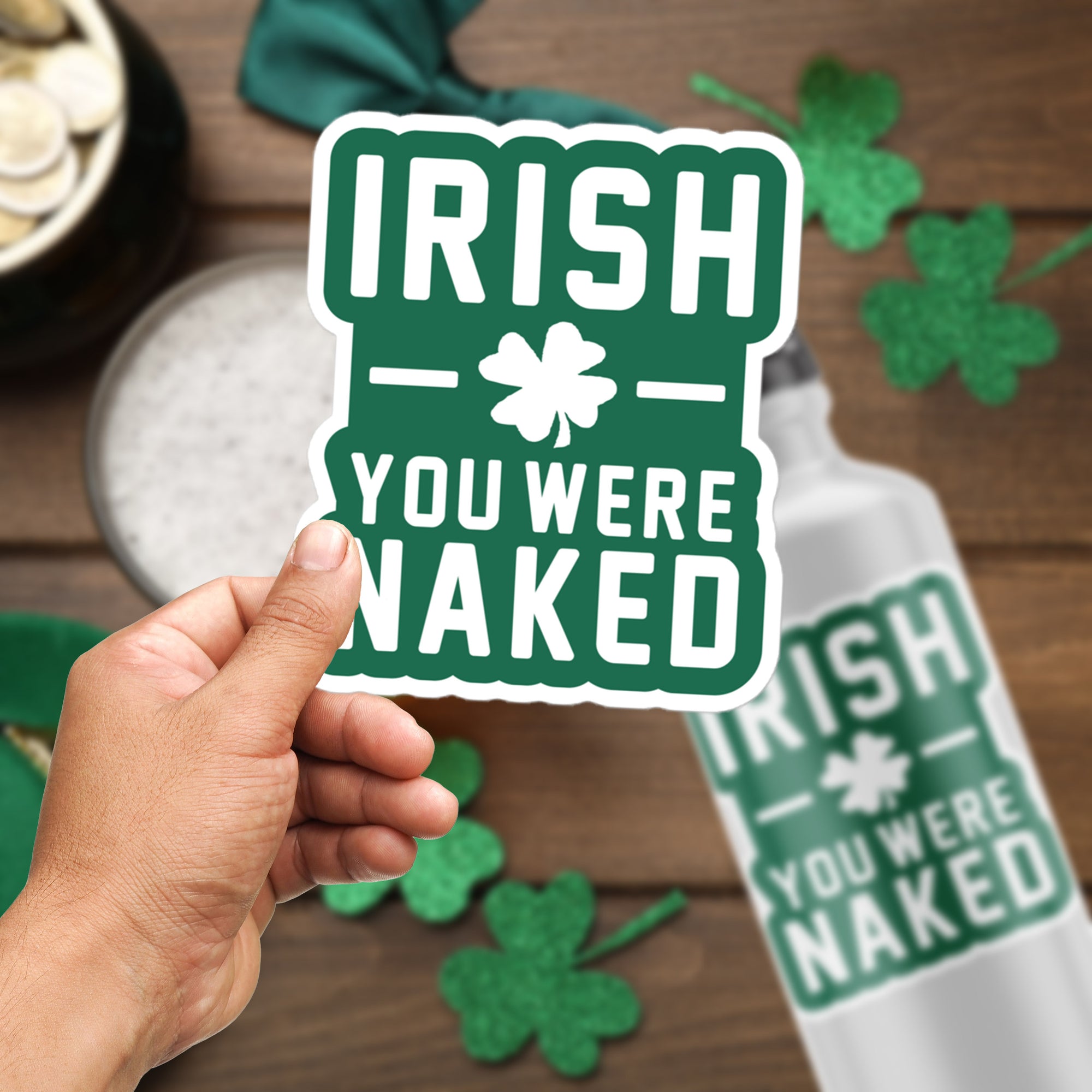 a person holding a sticker that says irish you were naked