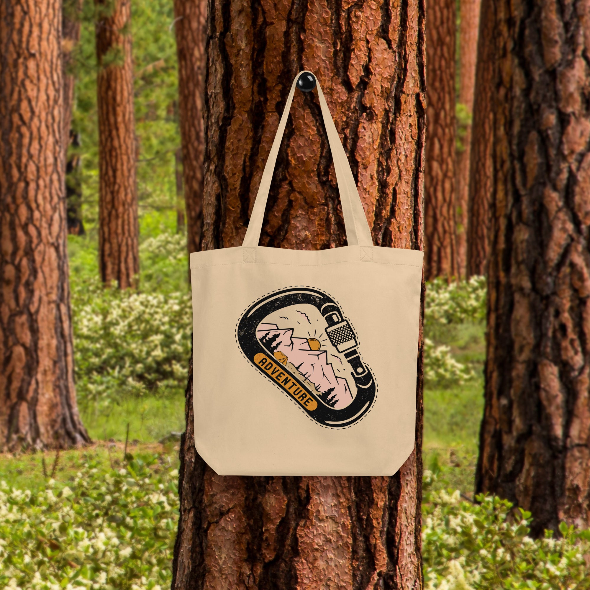 a white bag hanging from a tree in a forest