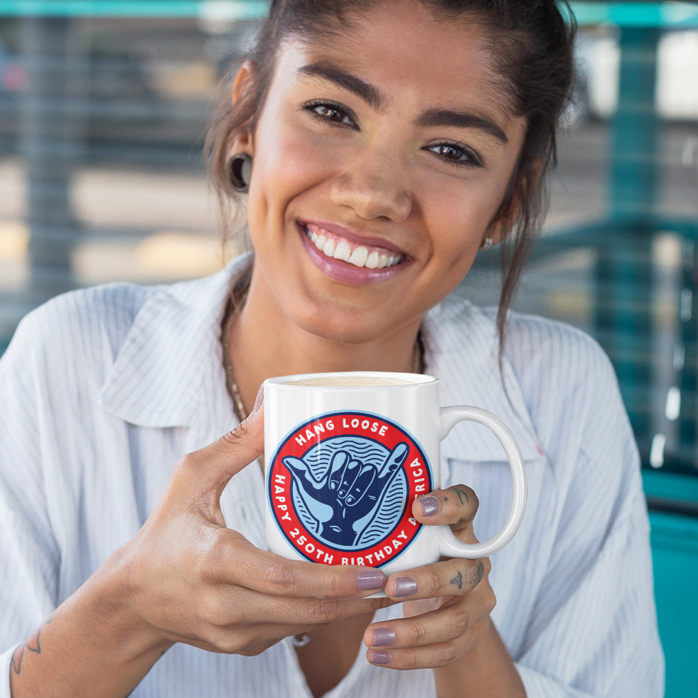 a woman holding a coffee mug in her hands