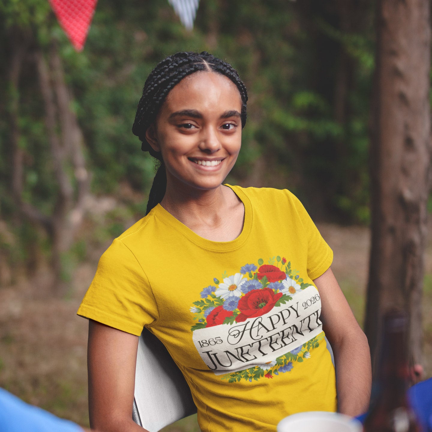 a woman in a yellow shirt holding a white frisbee