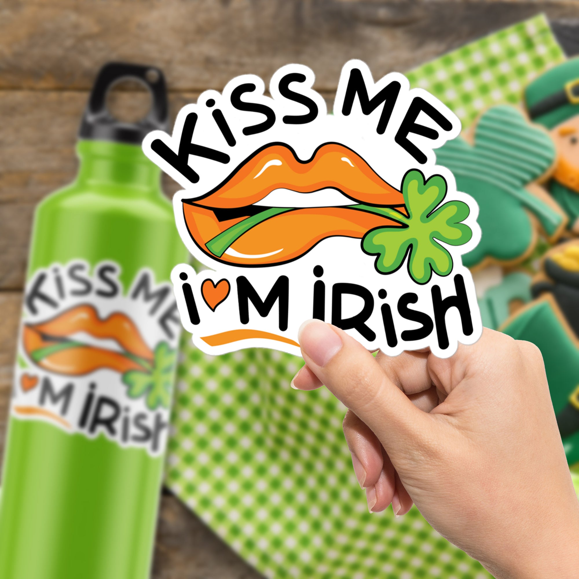 a person holding a sticker that says kiss me i'm irish