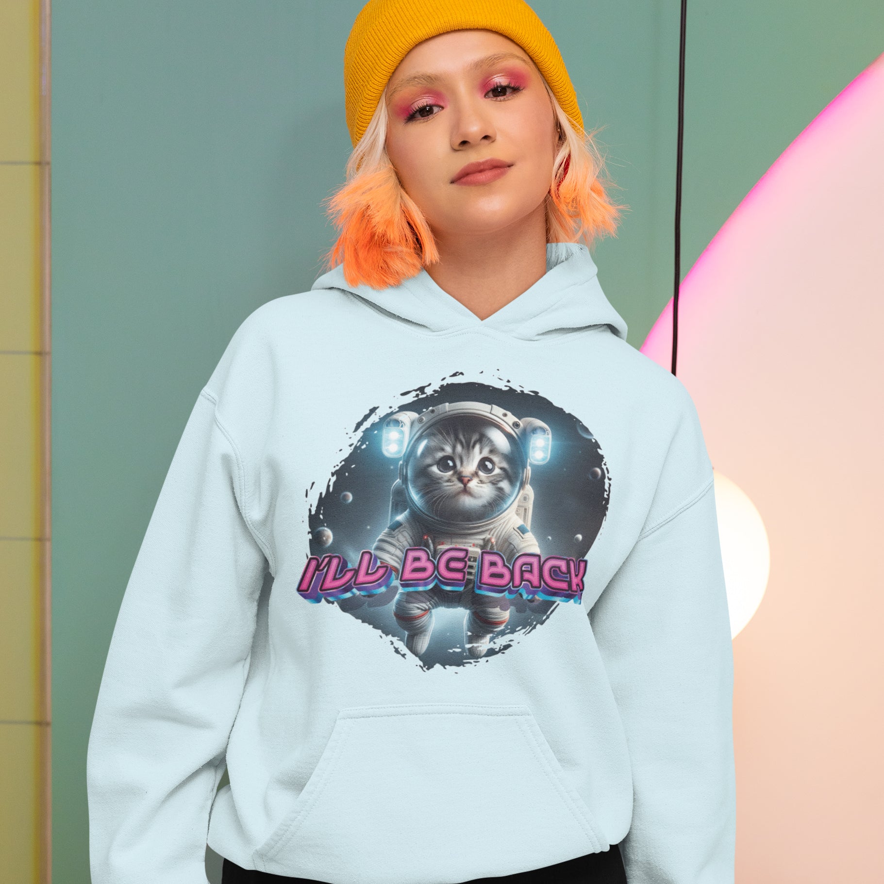 a girl with orange hair wearing a blue hoodie