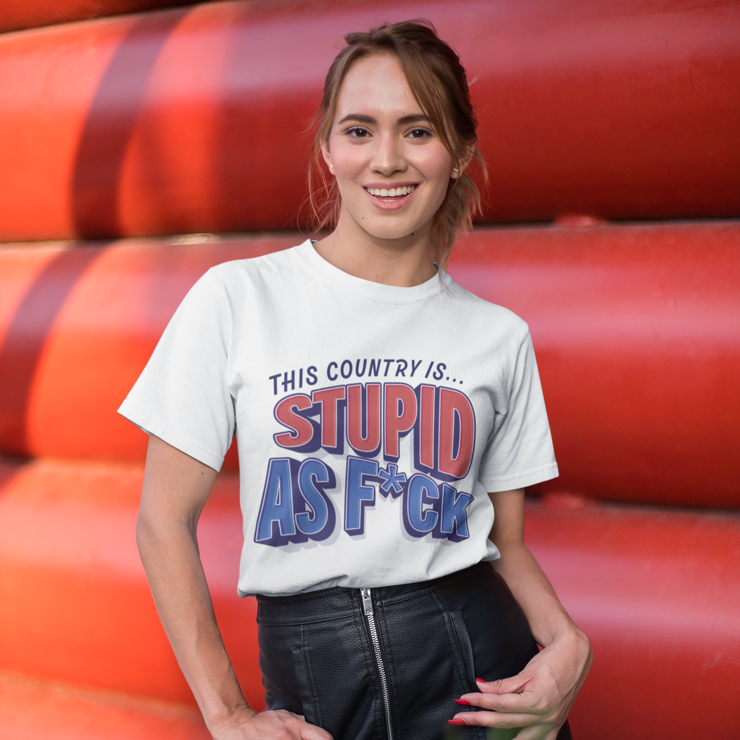 a woman wearing a t - shirt that says, this country is stupid as f