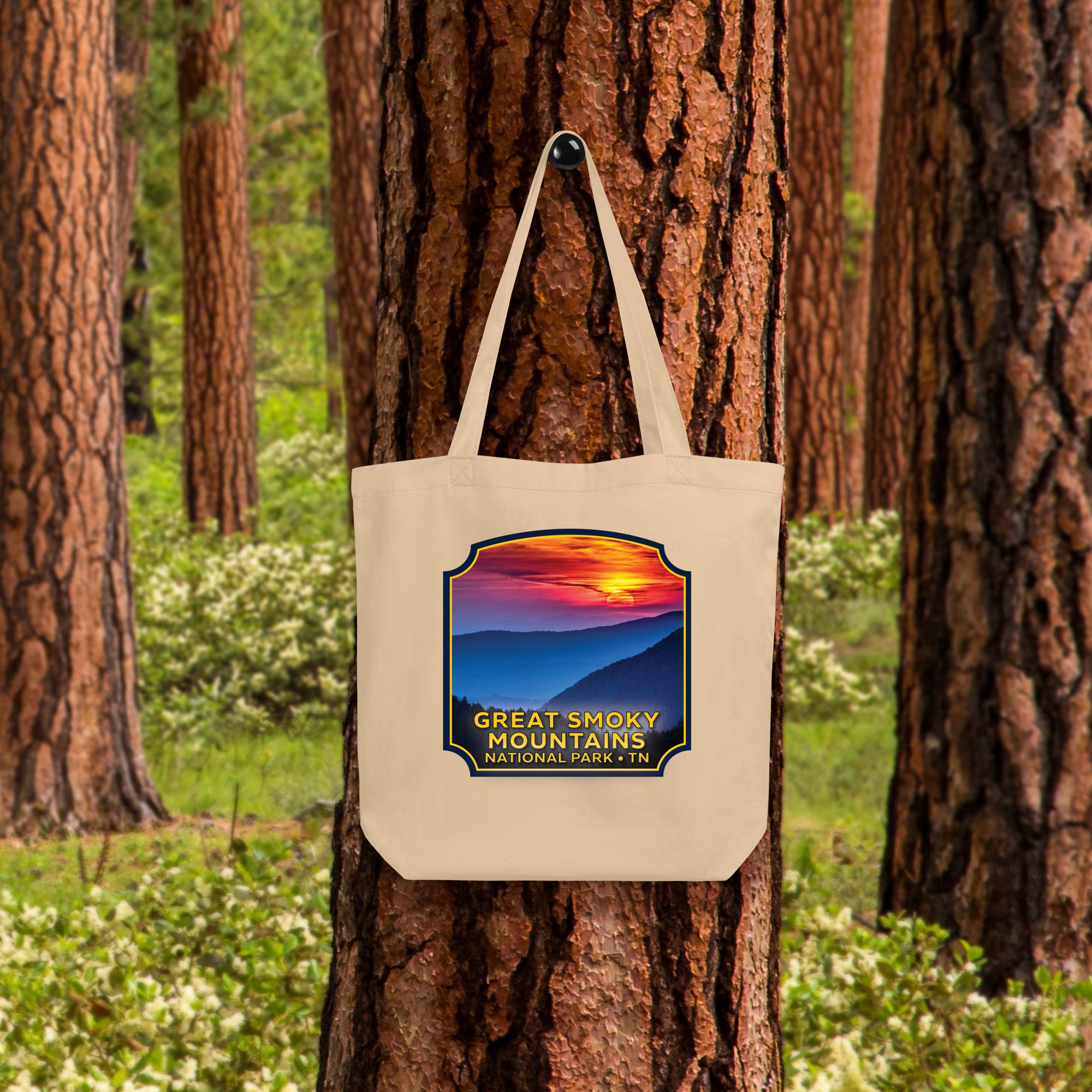 a bag hanging from a tree in a forest