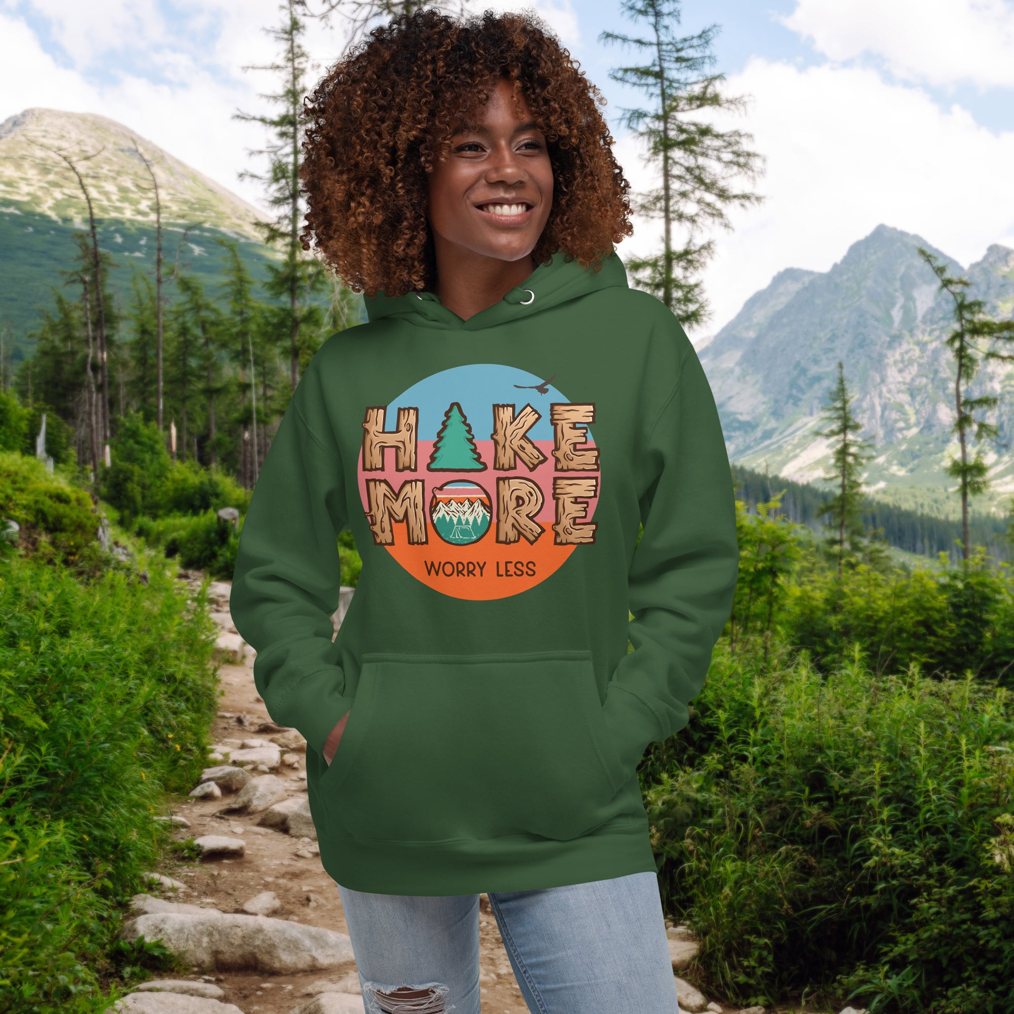 a woman wearing a green hoodie that says make more worry less