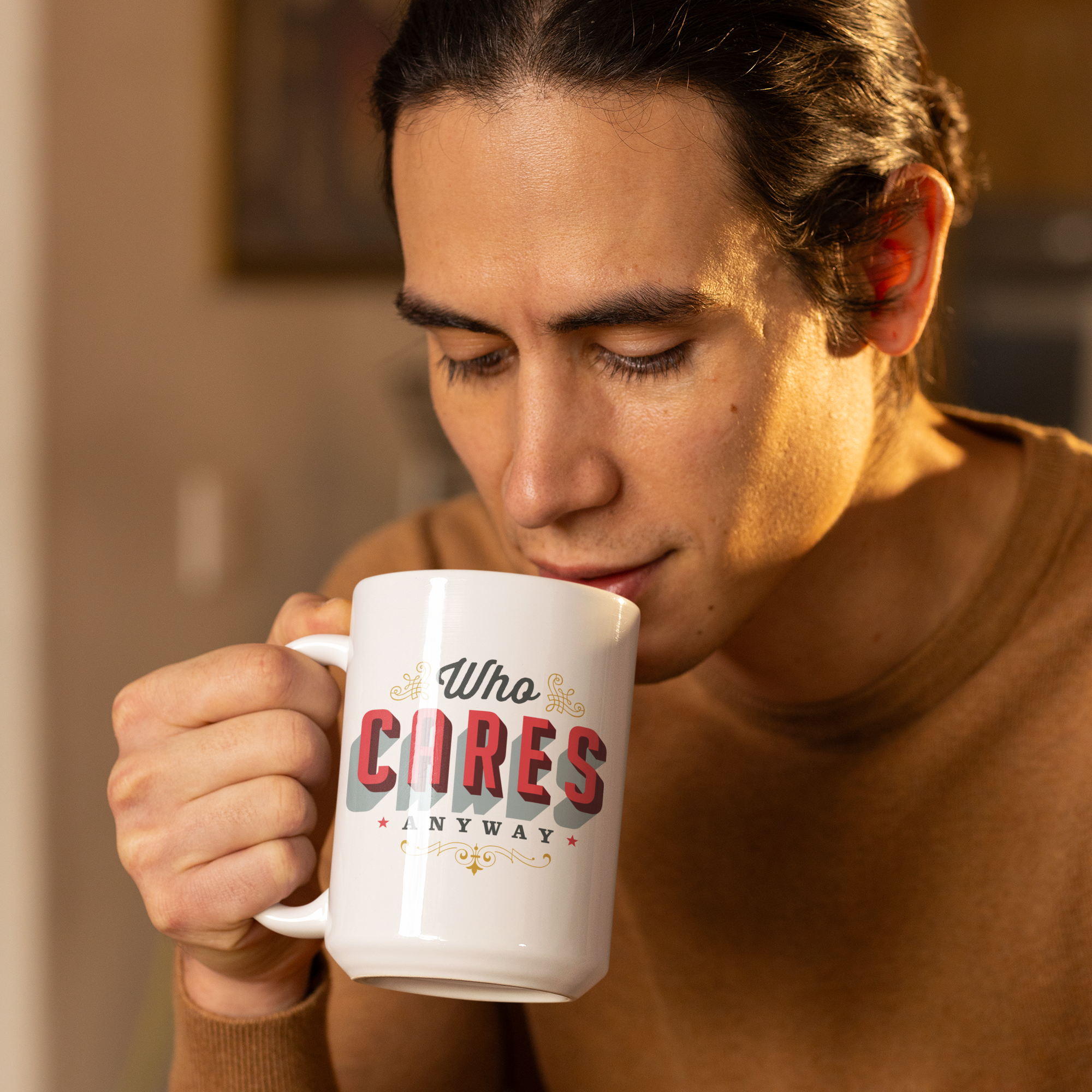 a man is holding a coffee mug in his hand