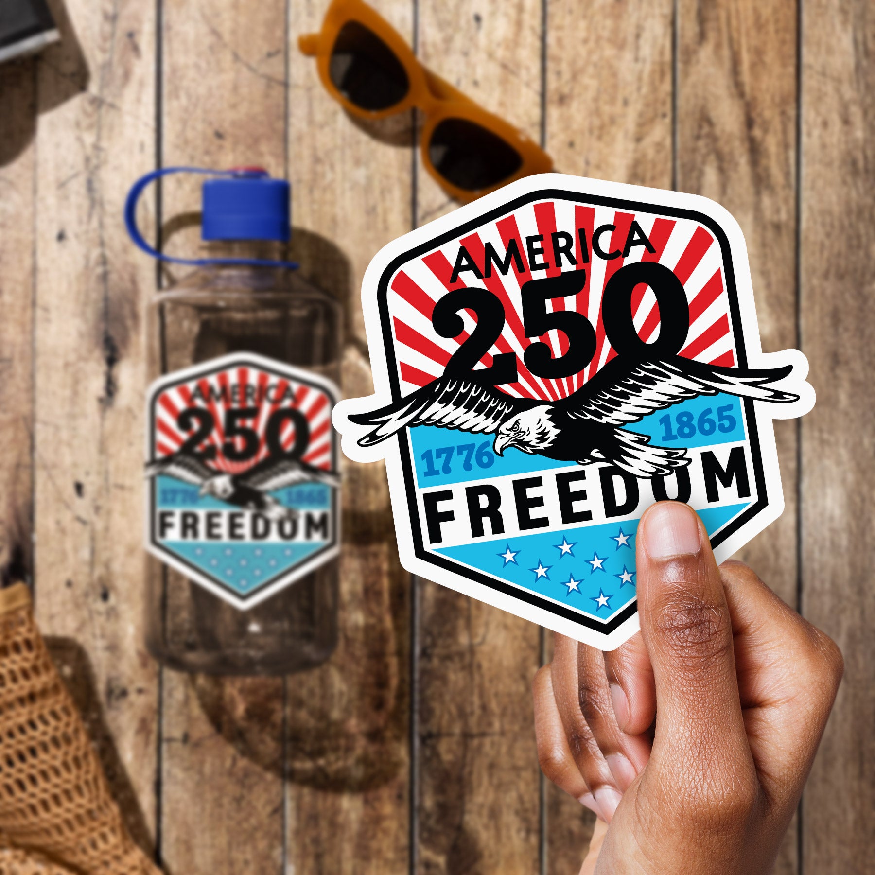 a person holding up a sticker that says america's 50 states of freedom