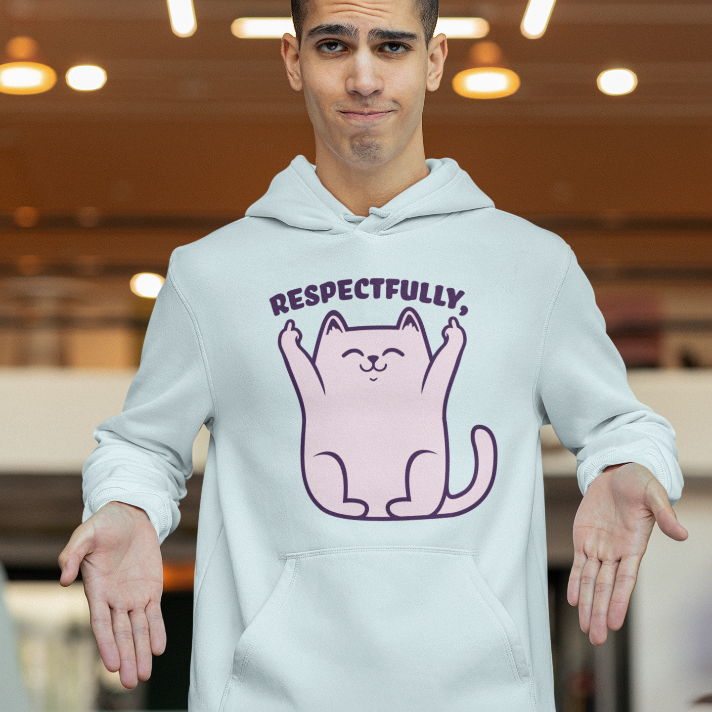 a man in a white hoodie with a cat on it