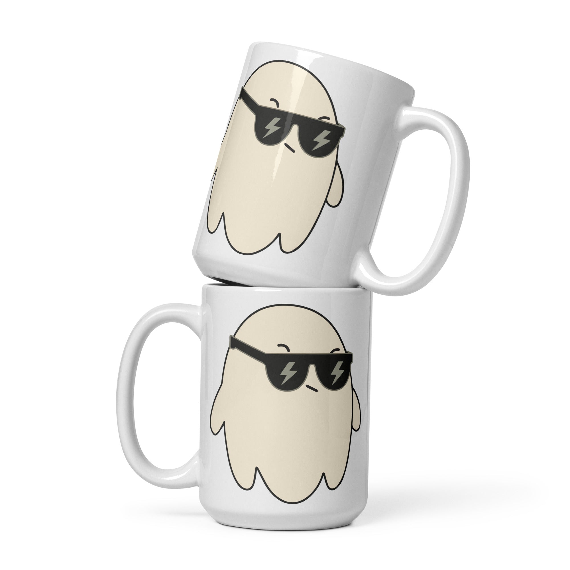 two white coffee mugs with sunglasses on them