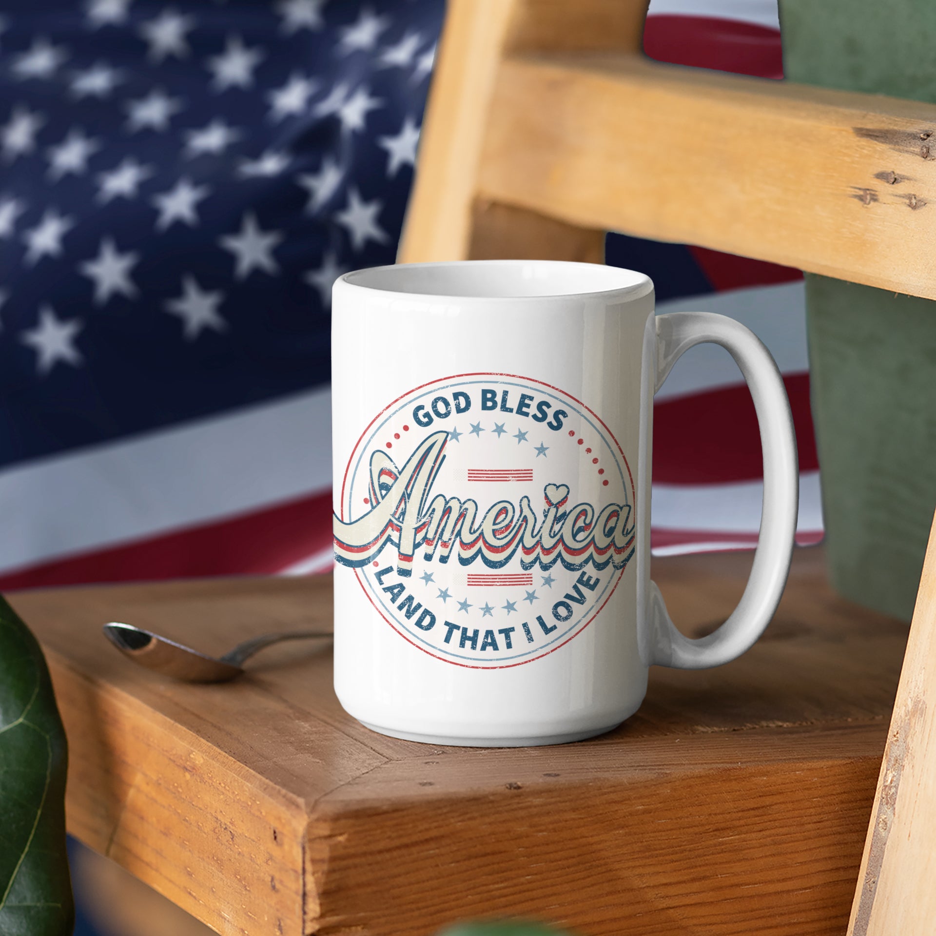 a white coffee mug sitting on top of a wooden table