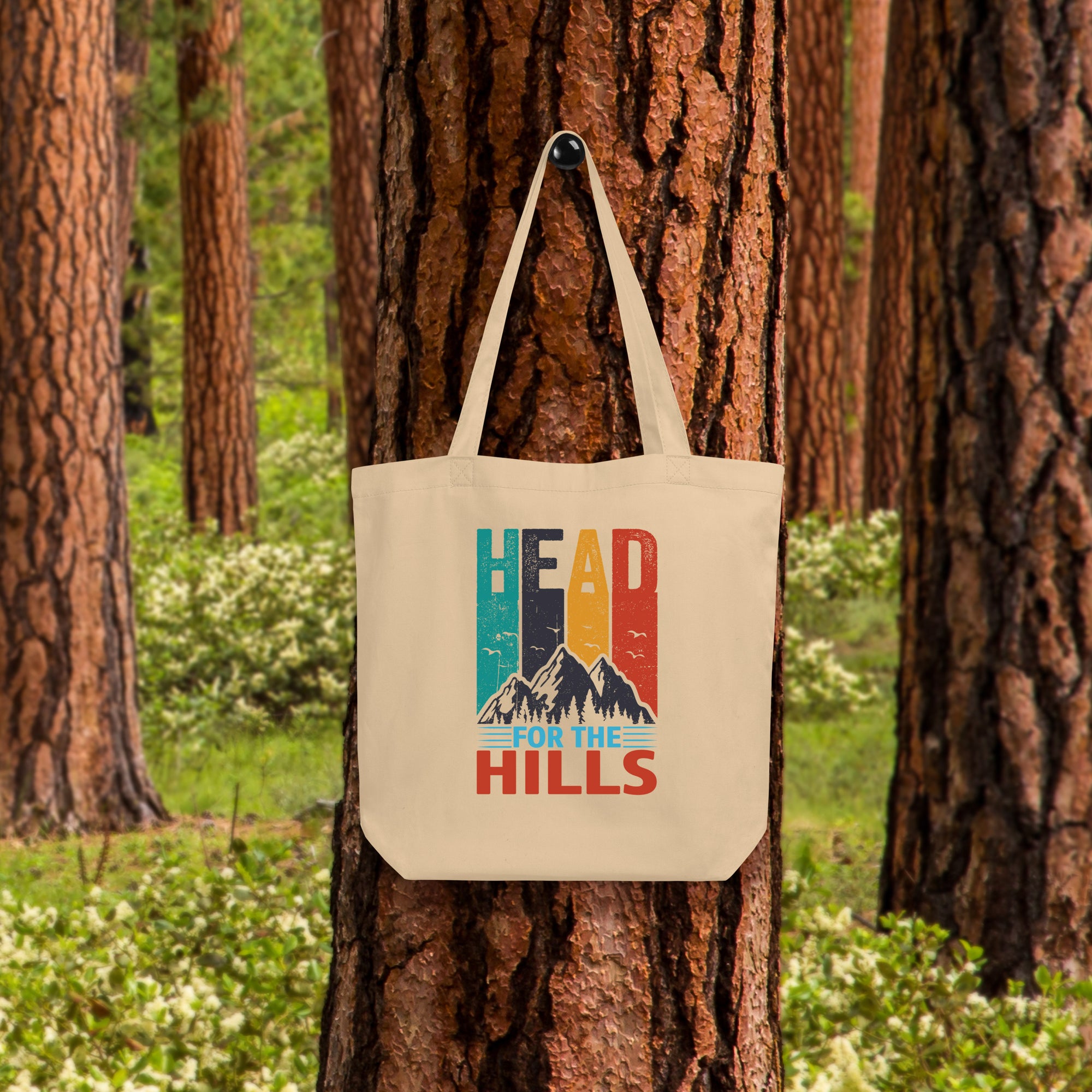 a bag hanging from a tree in a forest