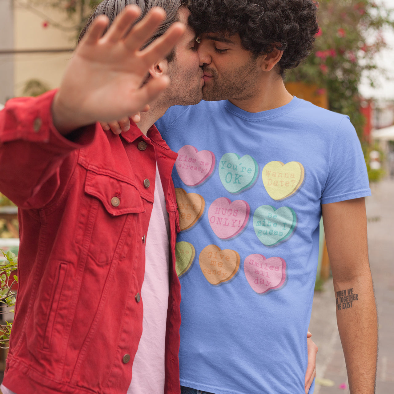 a couple of men standing next to each other