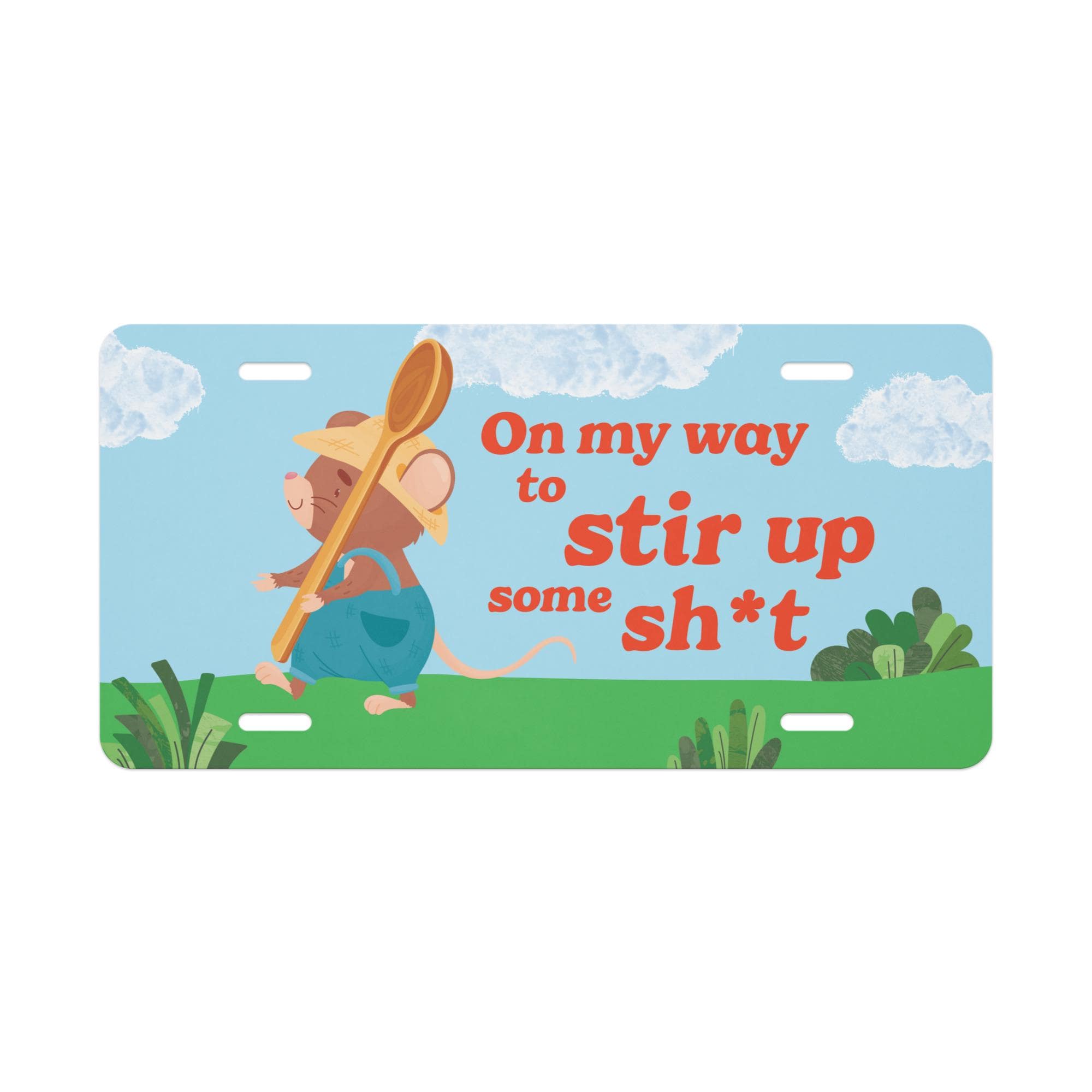 A cartoon mouse holding a spoon and standing on a grassy field with clouds in the background.
