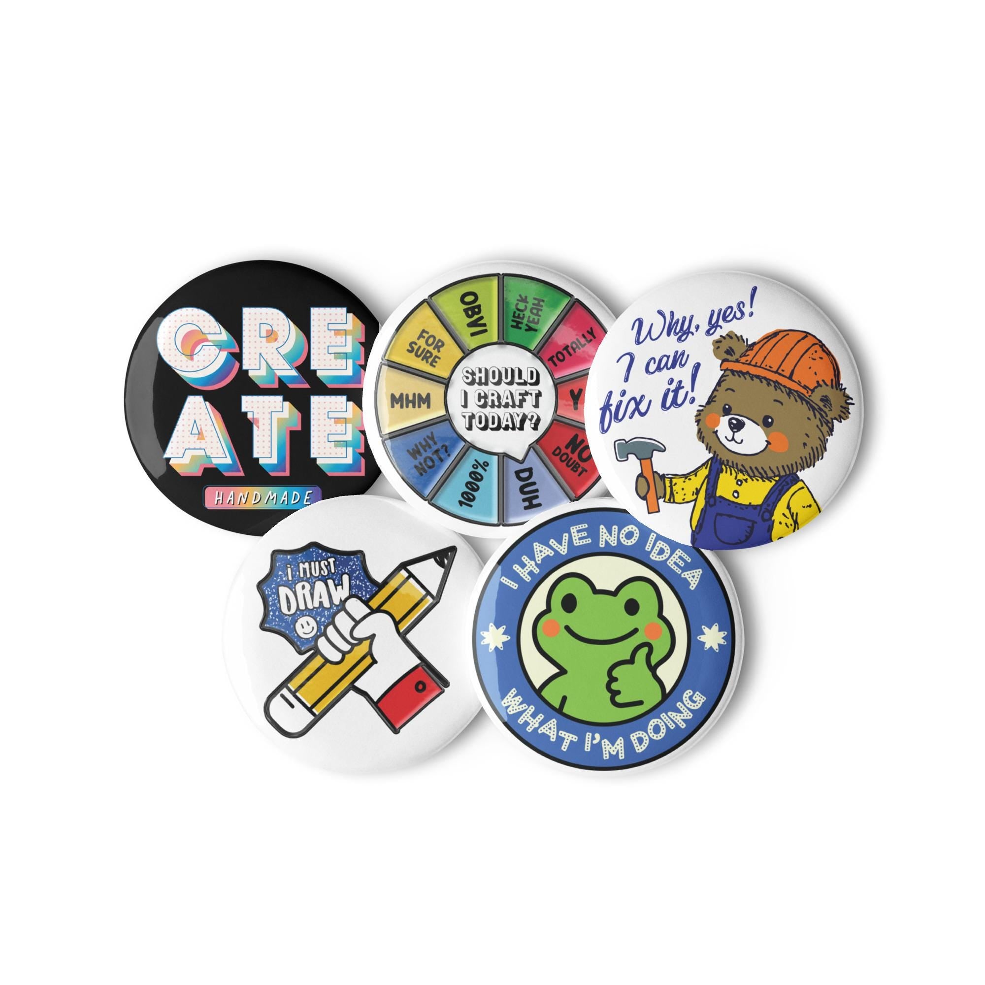 five colorful buttons with various designs and text, including a black button with the word "CREATE" and a round wheel with different colored sections.